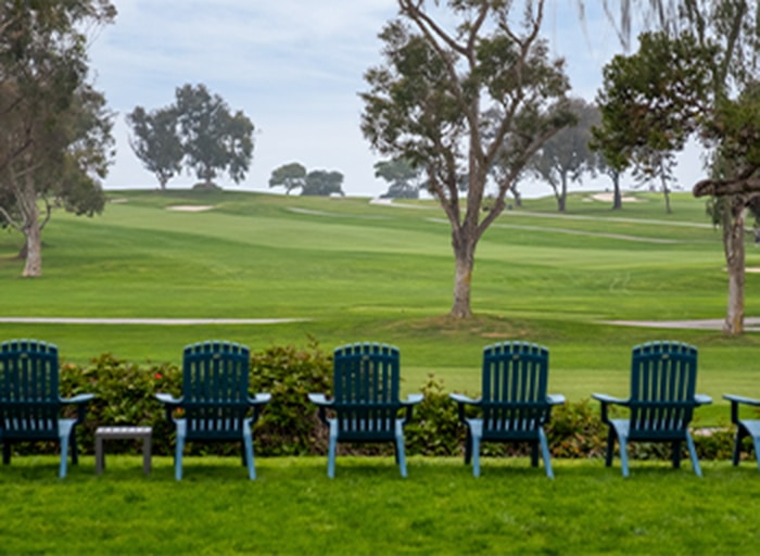 Chairs at the Lookout at Hilton La Jolla Torrey Pines resort golf course.